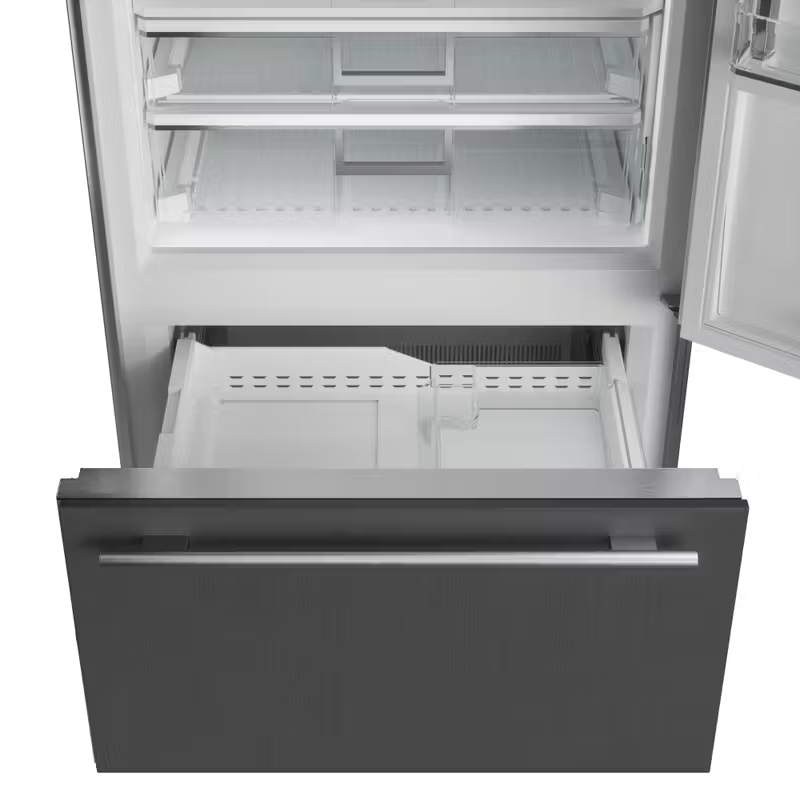 Sub-Zero Classic Series refrigerator with open drawers, showcasing its dual refrigeration system and spacious storage, perfect for keeping fresh foods and holiday dishes organized and fresh for hosting.